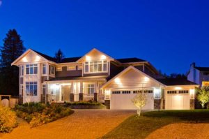 home with exterior lighting