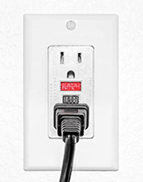 Close up of GFCI Outlet showing test and reset buttons